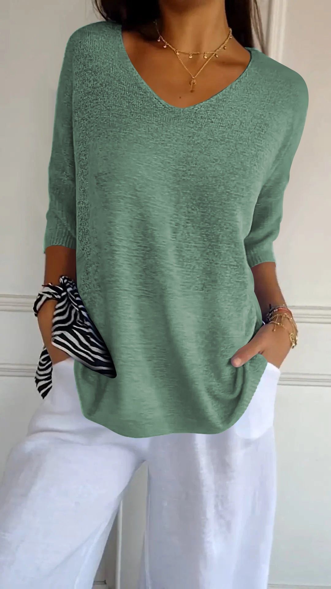 Slimming V-neck solid color knit top for women